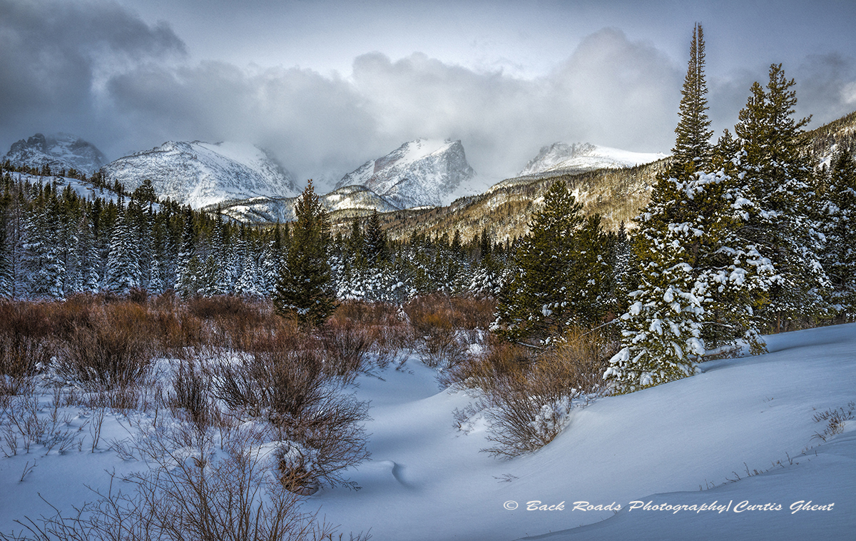 Fresh snow covers the park and another snowstorm prepares to move in.