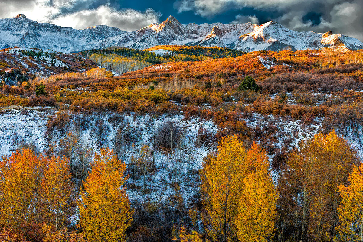 Beautiful fall sunrise, some fresh snow and dramatic clouds make for an awesome way to start the day.