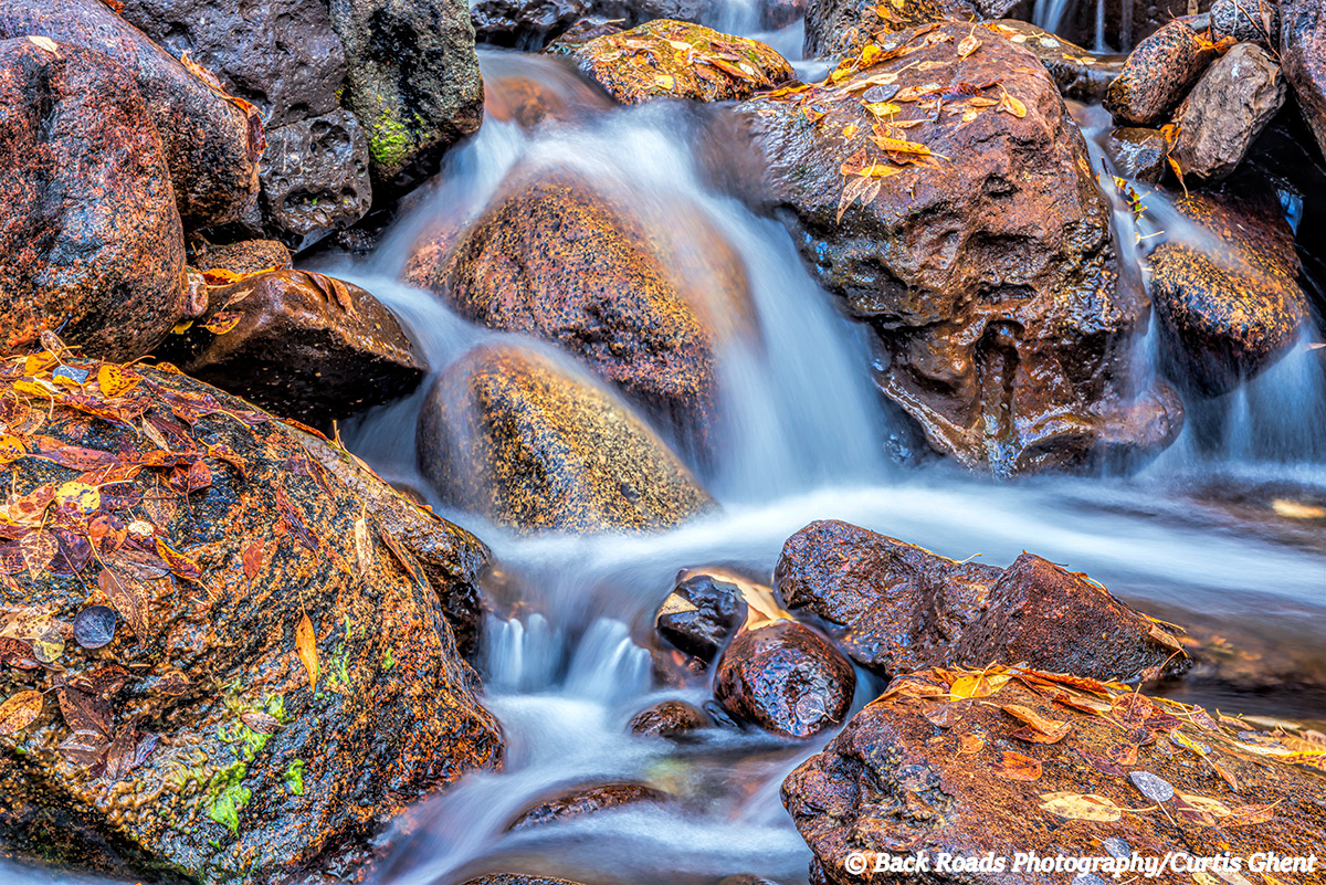 While wandering around in the backcountry of Rocky Mountain National Park I came across the little water fall covered with the...