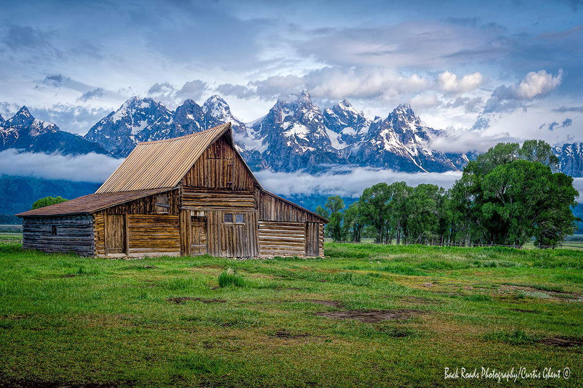 Moulton Barn with the Tetons in the background basking in the morning light.