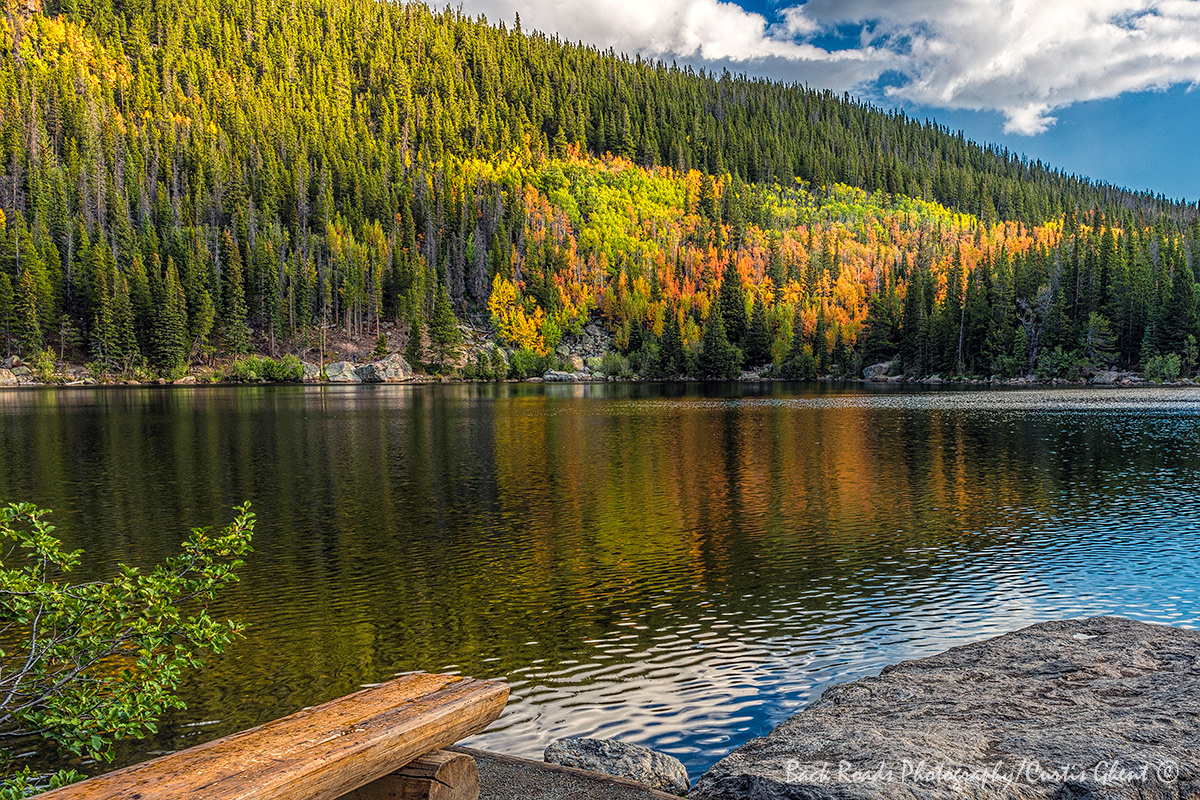 On a beautiful day this bench on the south shore of Bear Lake is perfect for viewing the fall color.